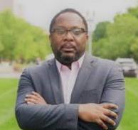 Raymond Jones in front of the Capitol Building