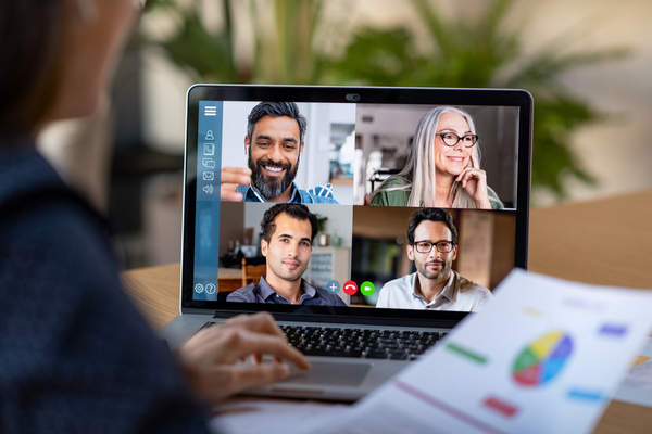 Video conference with four people participating on screen.
